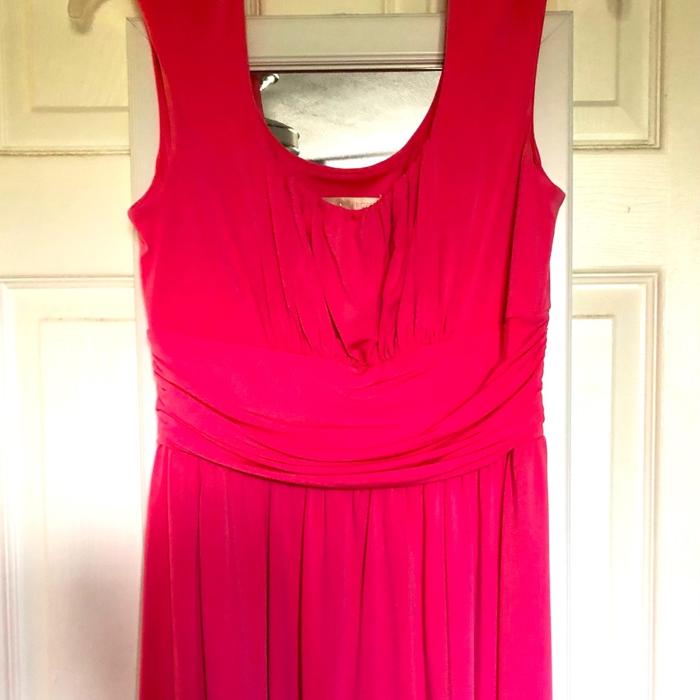 Fuchsia dress with flattering bodice.